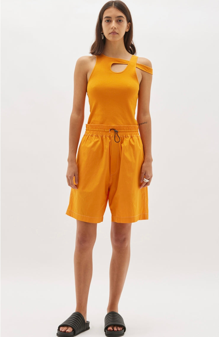 Women's tangerine top edged with double topstitching